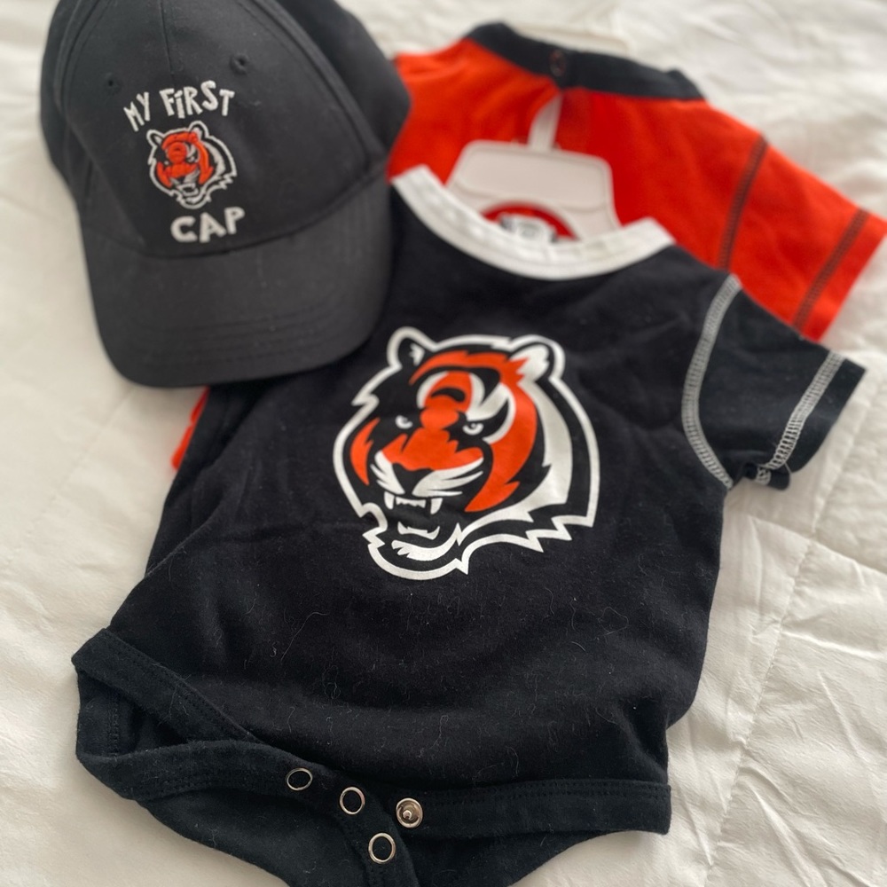 0-3 month Cincinnati Bengals pack- 2 onesies and a baby size cap. Never worn.
